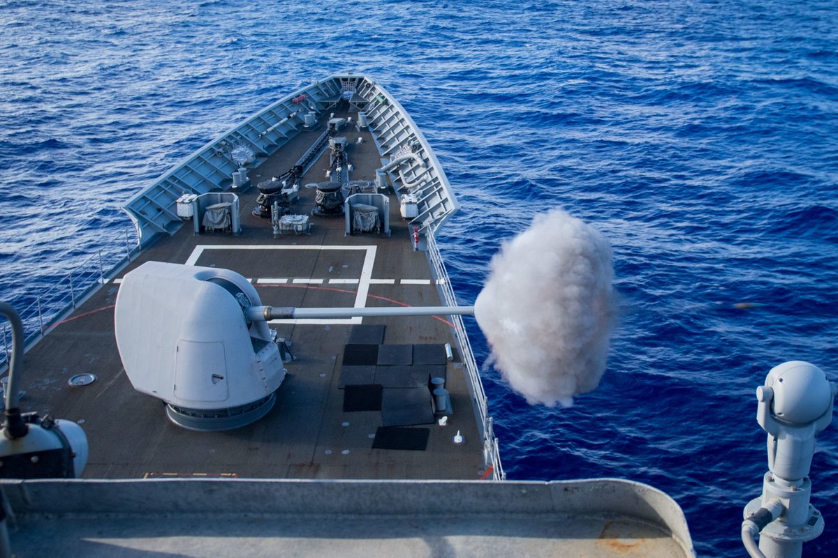 Japan-based US cruiser SHILOH CG67 on patrol this month in the Philippine Sea: launching an SM-2 Standard missile during exercises on 19 March; firing her forward Mk45 5-inch gun on 10 March; underway with destoyer BARRY DDG52 on 17 March