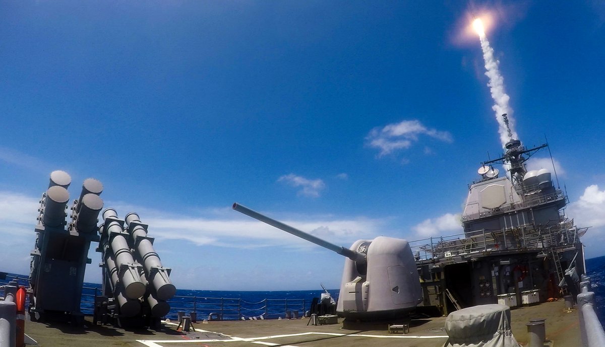 Japan-based US cruiser SHILOH CG67 on patrol this month in the Philippine Sea: launching an SM-2 Standard missile during exercises on 19 March; firing her forward Mk45 5-inch gun on 10 March; underway with destoyer BARRY DDG52 on 17 March