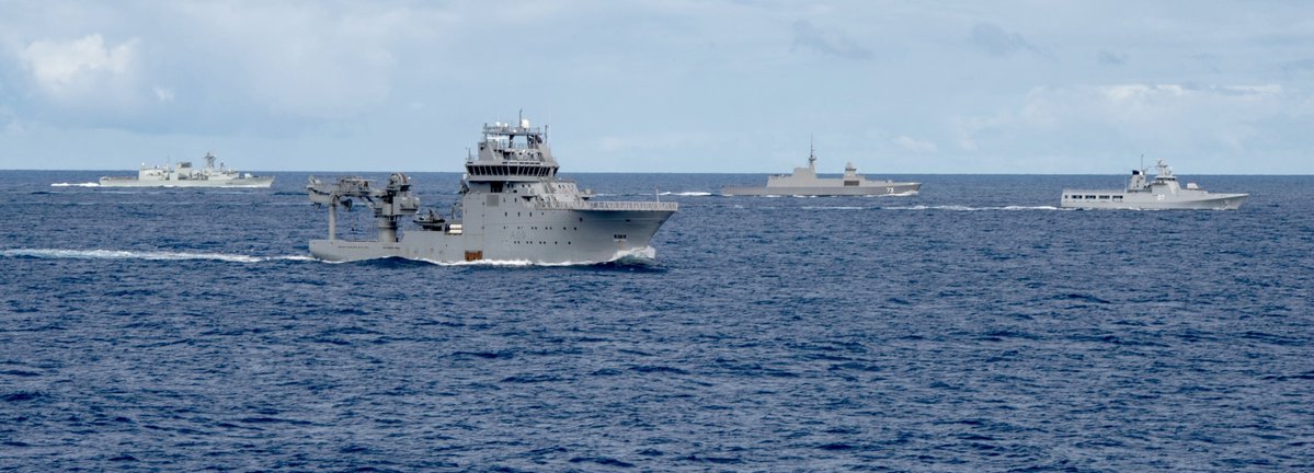 RIMPAC naval exercise scenes from 18 Aug: maneuvers led by assault ship ESSEX LHD2; Australian oiler SIRIUS AO266 refueling Japan's ISE DDH182; New Zealand's MANAWANUI A09 with Canadian WINNIPEG 338, Singapore's SUPREME 73 and Brunei's DARULEHSAN (07)