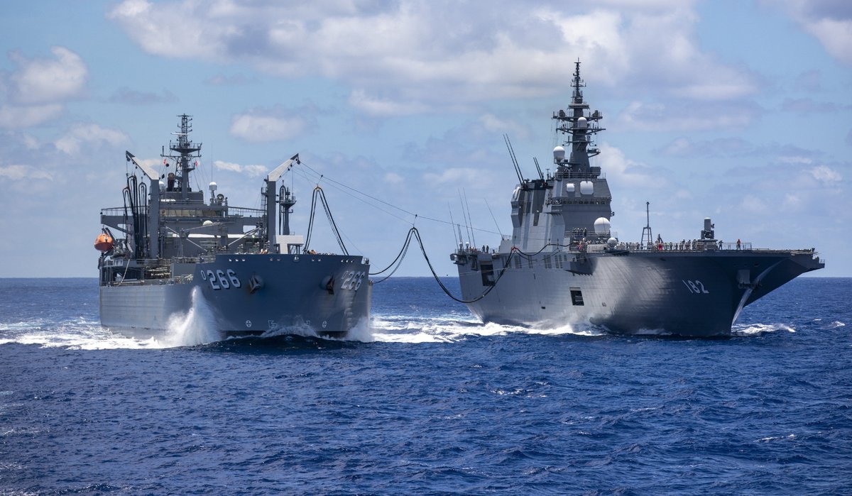 RIMPAC naval exercise scenes from 18 Aug: maneuvers led by assault ship ESSEX LHD2; Australian oiler SIRIUS AO266 refueling Japan's ISE DDH182; New Zealand's MANAWANUI A09 with Canadian WINNIPEG 338, Singapore's SUPREME 73 and Brunei's DARULEHSAN (07)