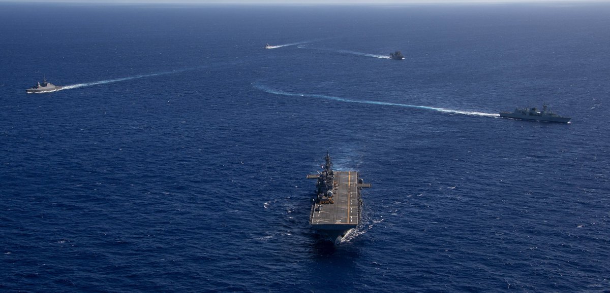 RIMPAC naval exercise scenes from 18 Aug: maneuvers led by assault ship ESSEX LHD2; Australian oiler SIRIUS AO266 refueling Japan's ISE DDH182; New Zealand's MANAWANUI A09 with Canadian WINNIPEG 338, Singapore's SUPREME 73 and Brunei's DARULEHSAN (07)