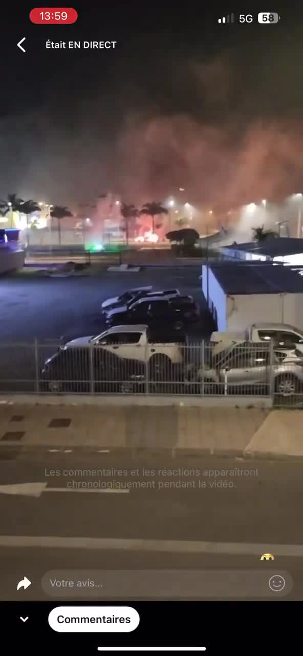The parking lot of the Mazda Vallée du Tir dealership in Nouméa