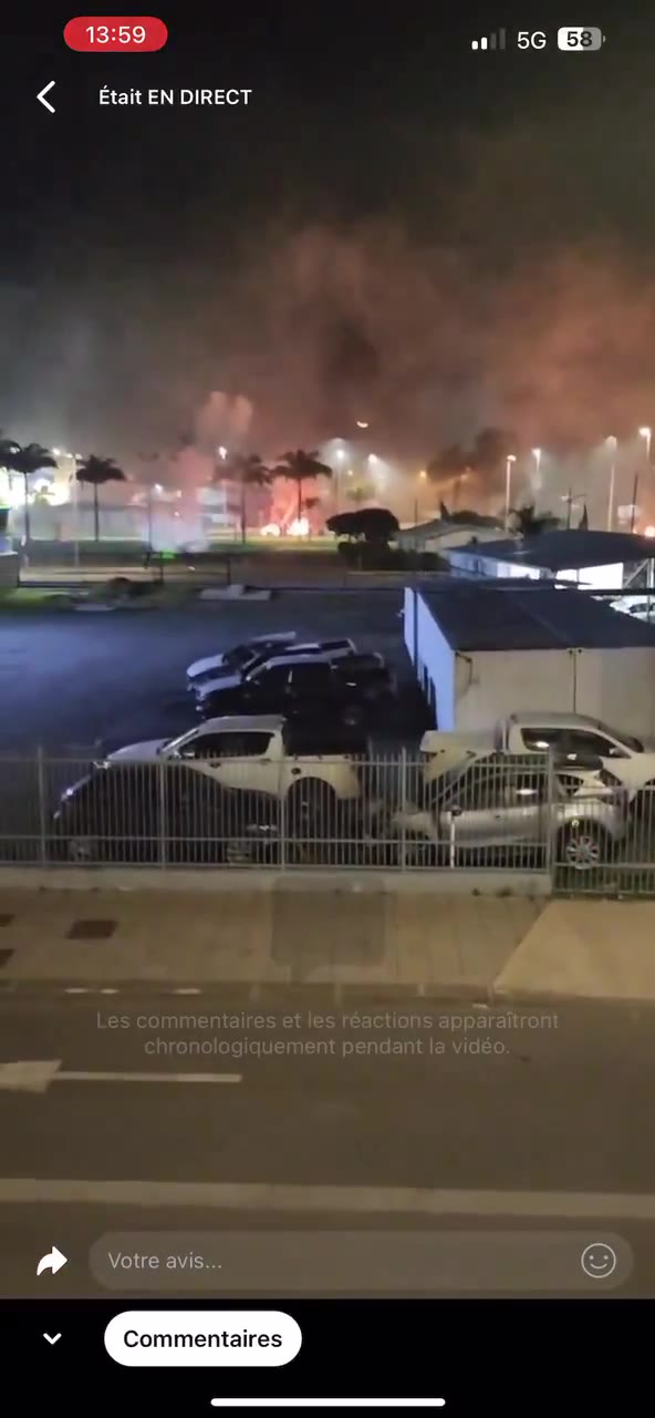 The parking lot of the Mazda Vallée du Tir dealership in Nouméa